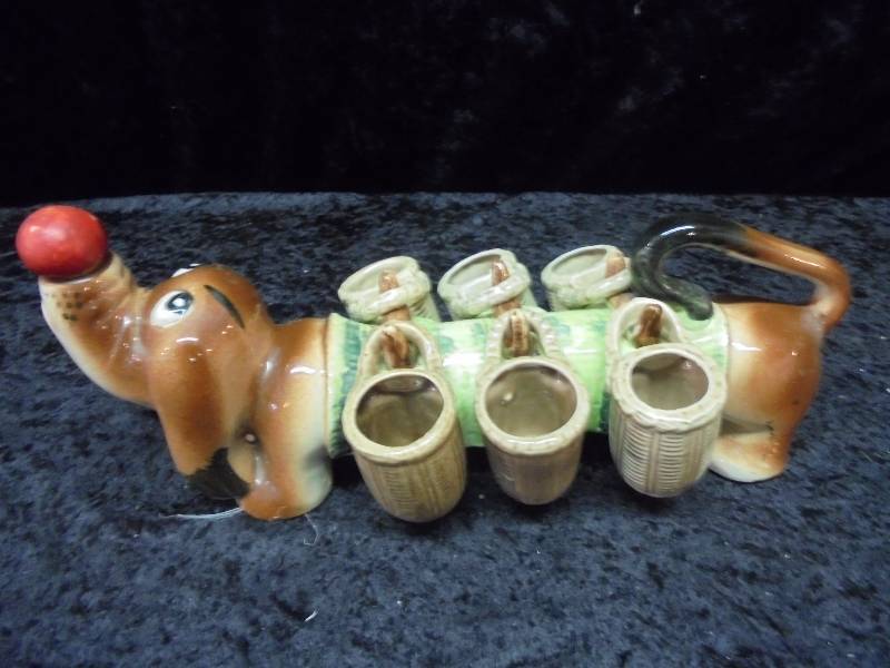 lot 55 image: Wiener Dog Decanter & Cups