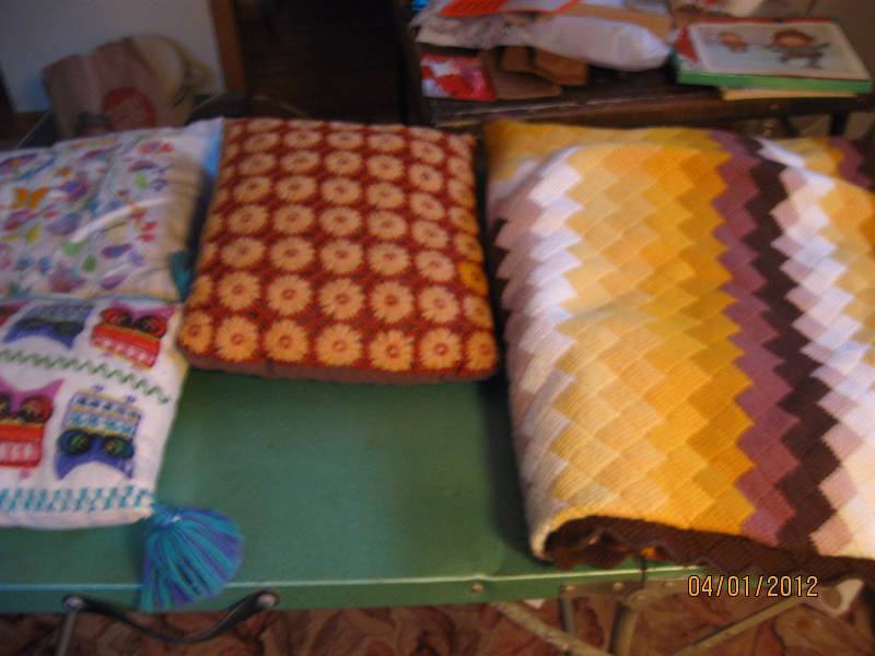 pillows, blanket, old teddy bear