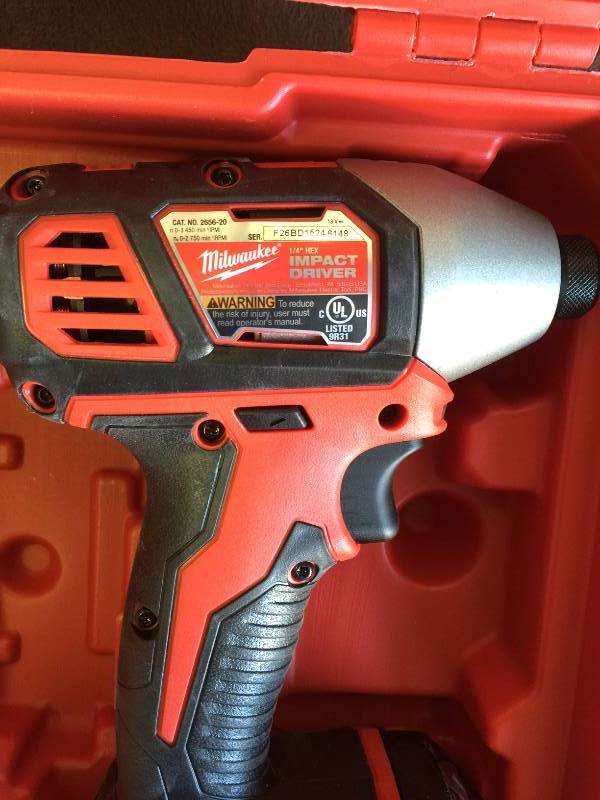 lot 21 image: Milwaukee M18 Lithium-Ion 14 in. Cordless Hex Impact Driver kit