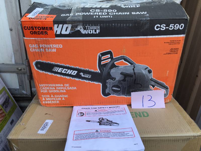 lot 13 image: ECHO 20 in. 59.8cc Gas Chainsaw Model # CS-590 IN LIKE New conditions