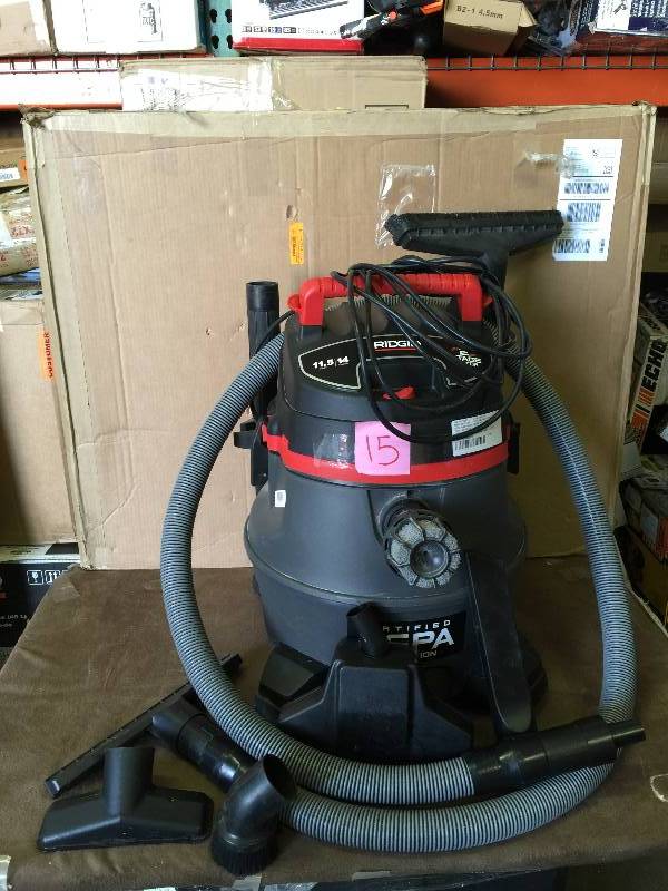 lot 15 image: Ridgid 14-Gal. HEPA WetDry Vacuum Model # RV2400HF Used working conditions