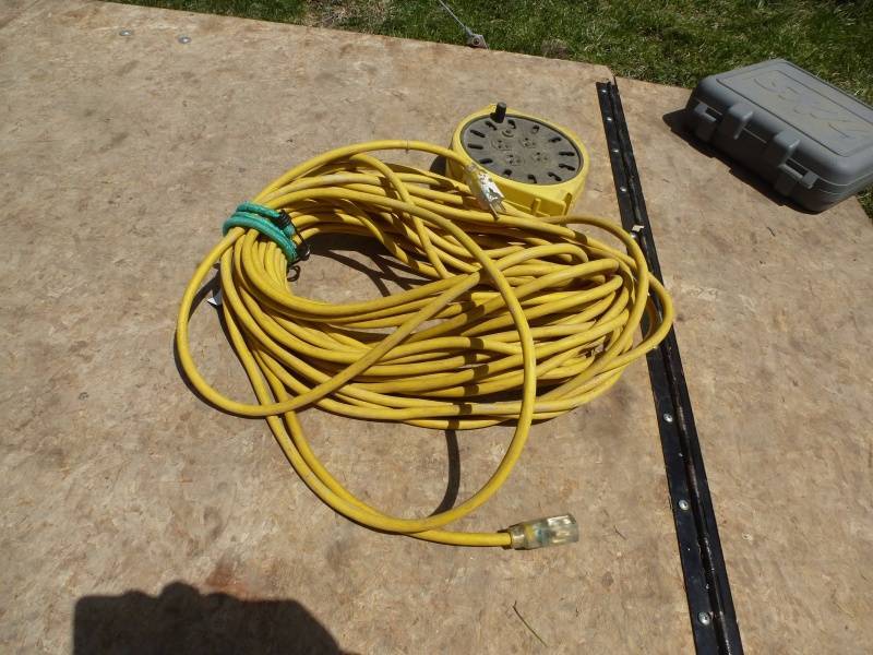 lot 71 image: Yellow Extension Cord & Reel
