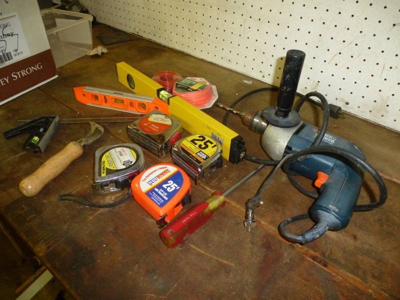 lot 132 image: Black & Decker Drill & Tape Measures