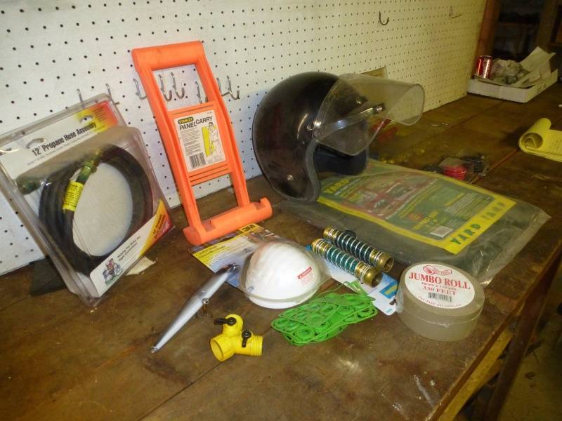 lot 134 image: Helmet, Yard tarp, Hose fittings, Propane hose