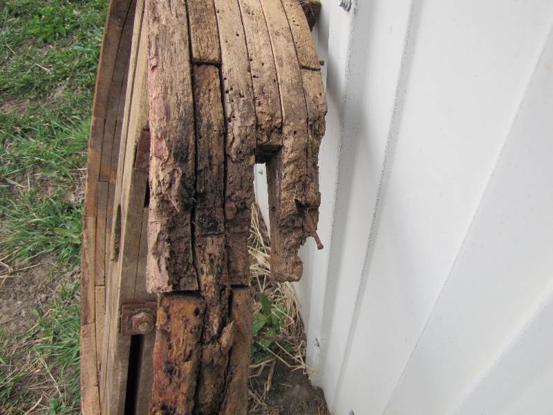 lot 24 image: Old Wooden Wagon Wheel