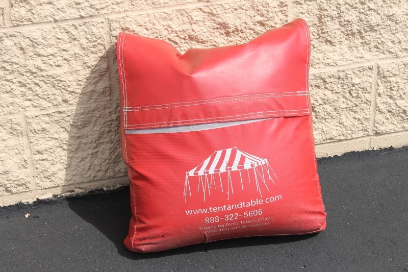 lot 44 image: RED Tent and Table Weight Bag
