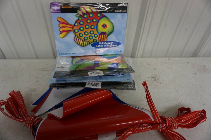 lot 38 image: Lot of 8 Anagram MylarFoil Super Shape Helium Fish Balloons