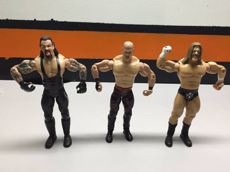 lot 6 image: UFC WRESTLER FIGURINES