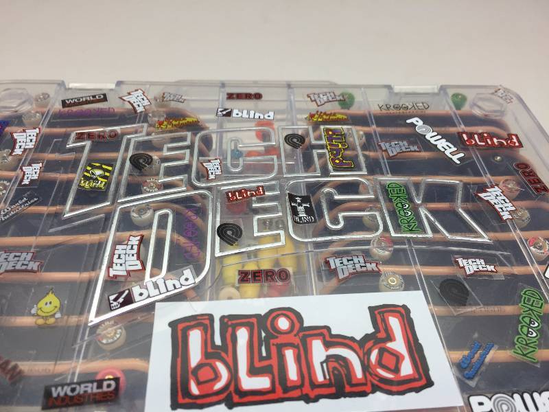 lot 15 image: TECH DECK MINI SKATE BOARD COLLECTION WITH CASE