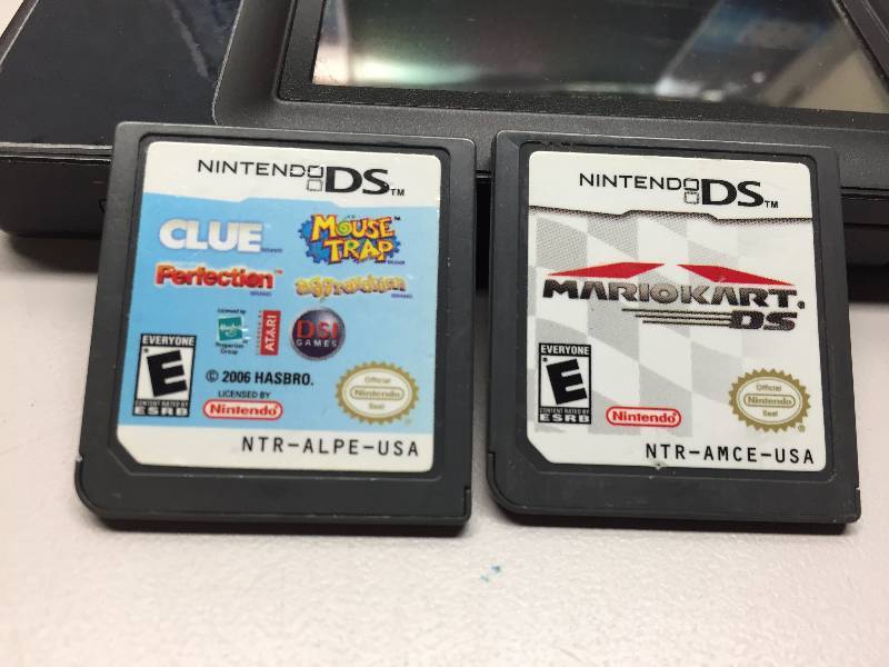 lot 23 image: NINTENDO DS WITH GAMES