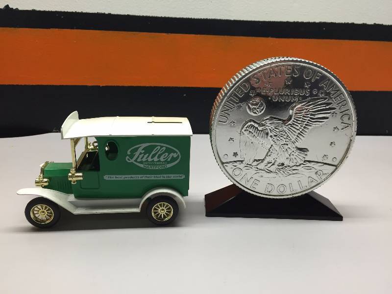lot 36 image: TRUCK AND COIN BANK
