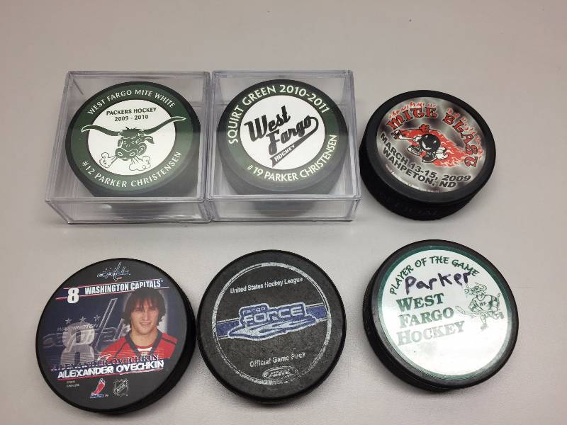 lot 61 image: HOCKEY PUCKS