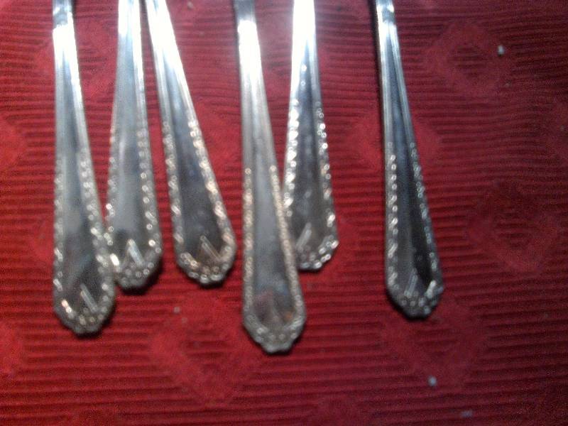 11 spoons 11 forks