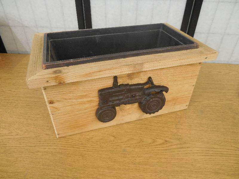 lot 34 image: HANDCRAFTED CEDAR TRACTOR PLANTER BOX
