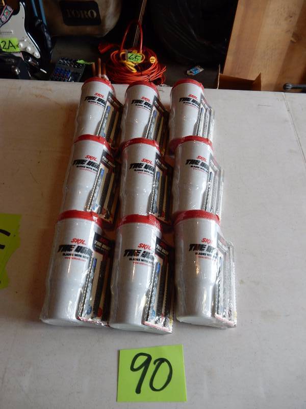 lot 90 image: Stocking Stuffers for the BOYS.. 9 Coffee cups with jig saw blades.