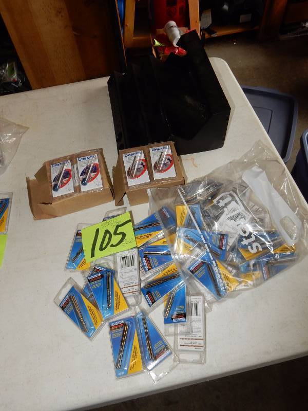 lot 105 image: Misc. Dremel Bits and holder, 9020, 570, 562