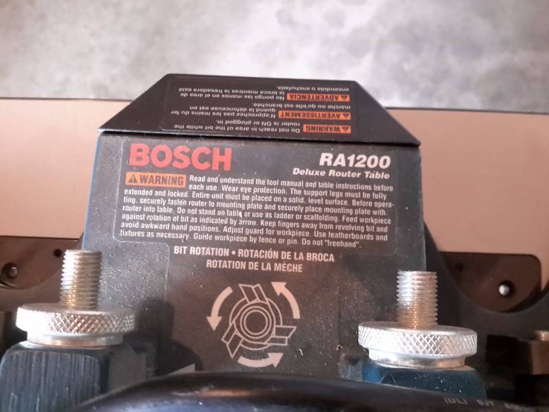 lot 1B image: BOSCH, RA 1200, Deluxe Router Table and roll of Dust Hose