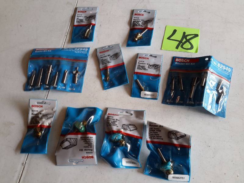 lot 48 image: Misc. BOSCH router bits as pictured. NEW in their packages
