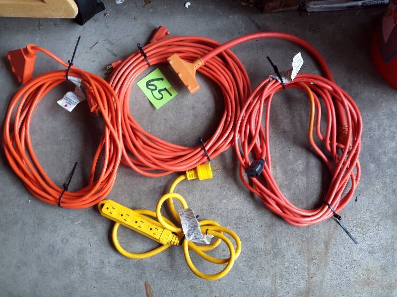 lot 65 image: 2, 25 ft heavy duty cords, 1, power strip.