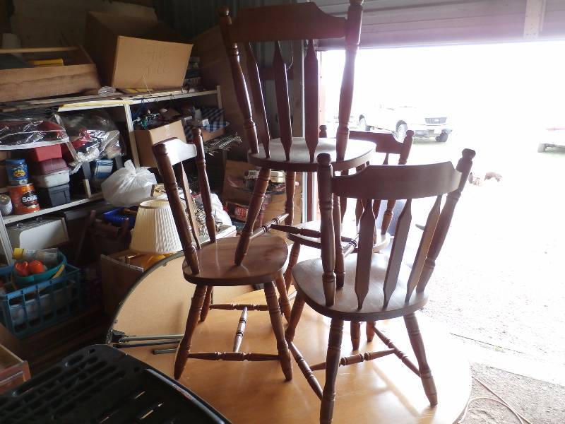 table and 4 matching chairs,table has a lower shelf below top to put more stuff