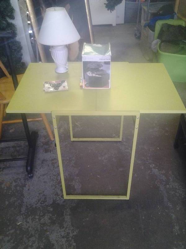 Lime Green Metal Table, White Lamp With Shade, Meditation Fountain