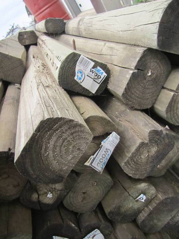 8 long green treated fence post, l...