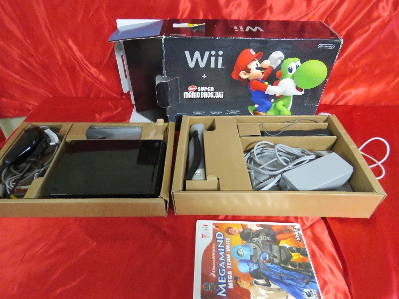 lot 111 image: Wii with controller aned game