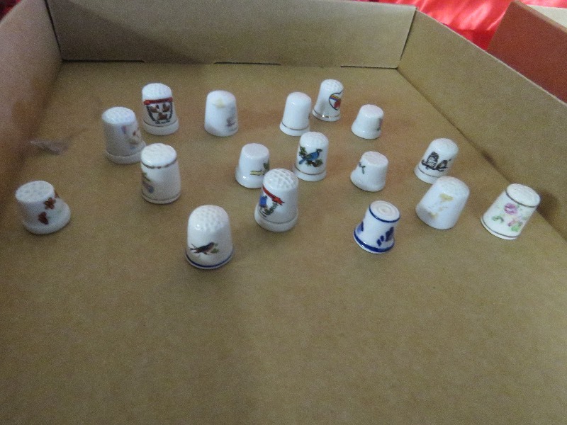 lot 115 image: Thimbles and more