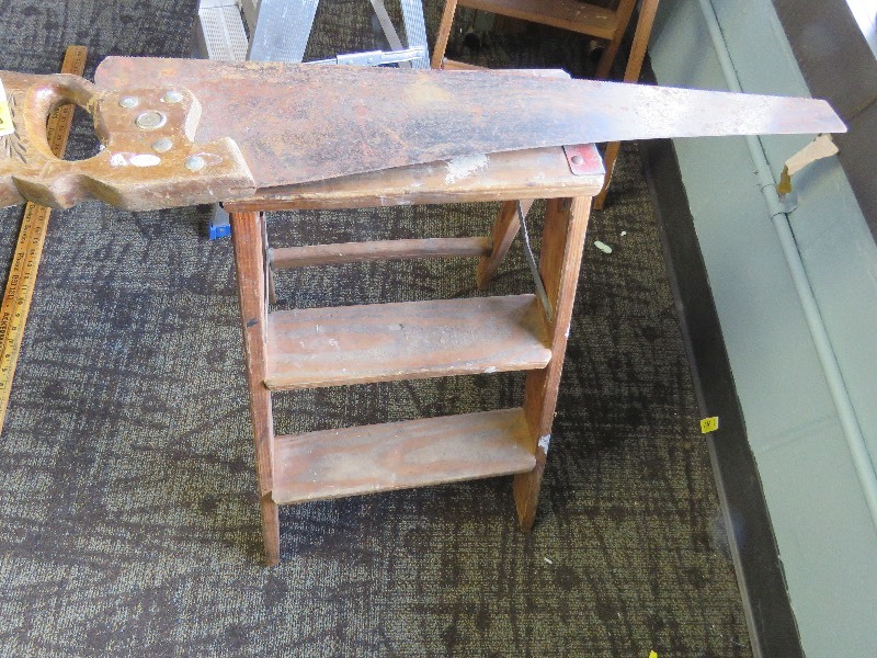 lot 245 image: vinatge saw and wood step stool