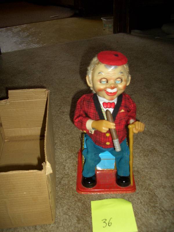 lot 36 image: Tin Toy Cigar Smoker