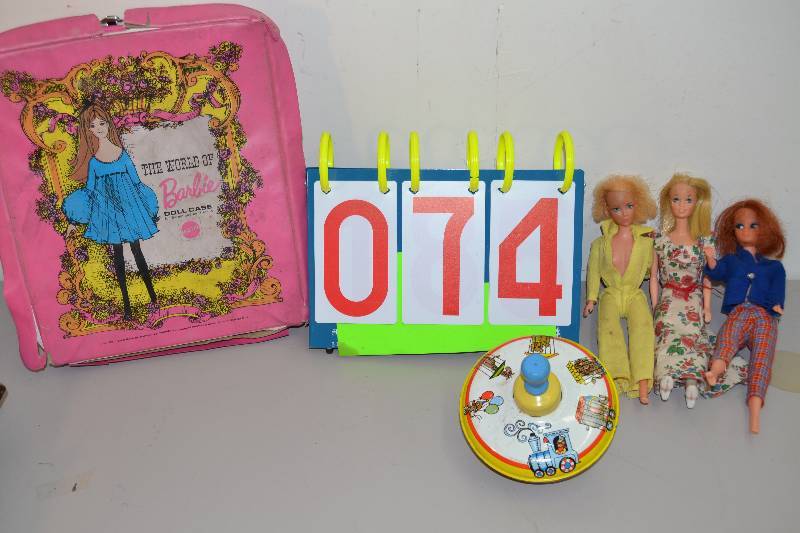 lot 74 image: Barbie Dolls & top