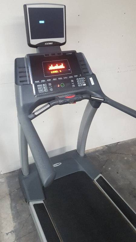 lot 4 image: Cybex 750T Legacy Series Commercial Treadmill.  Includes attached Cybex TV entertainment package.