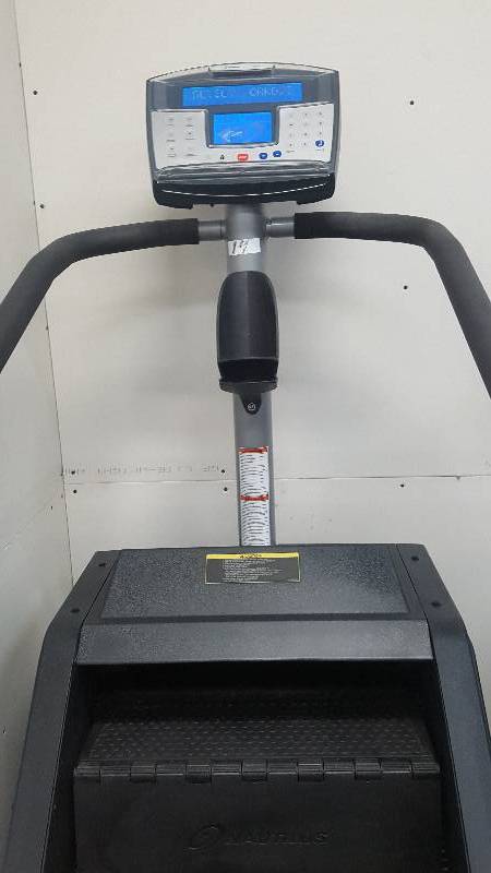 lot 14 image: Nautilus SM916 Commercial Grade Stepmill.  Plastic steps.