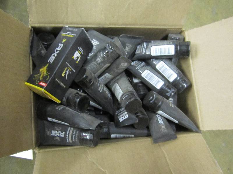 Box of Axe spike glue...