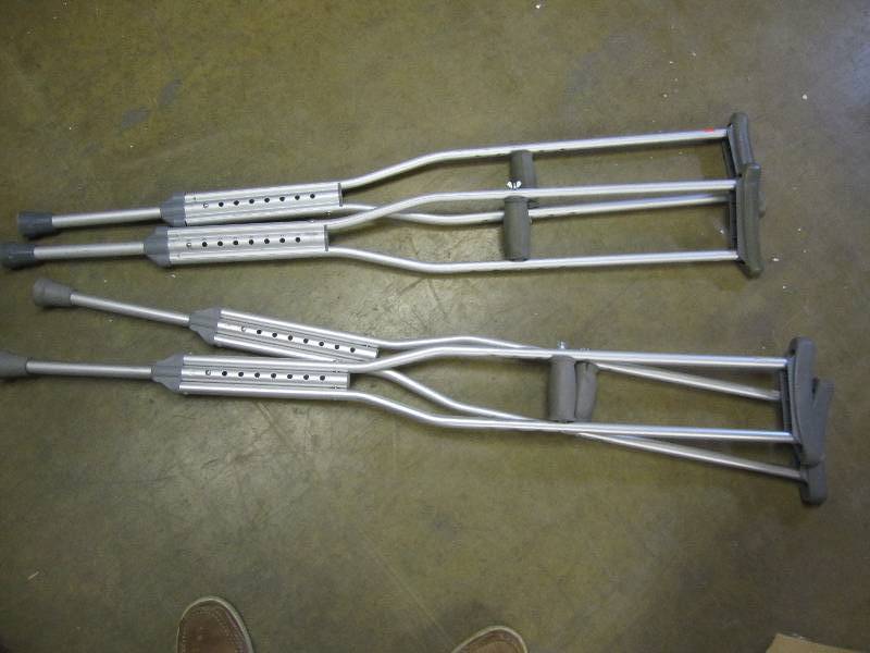 2 pairs of crutches...