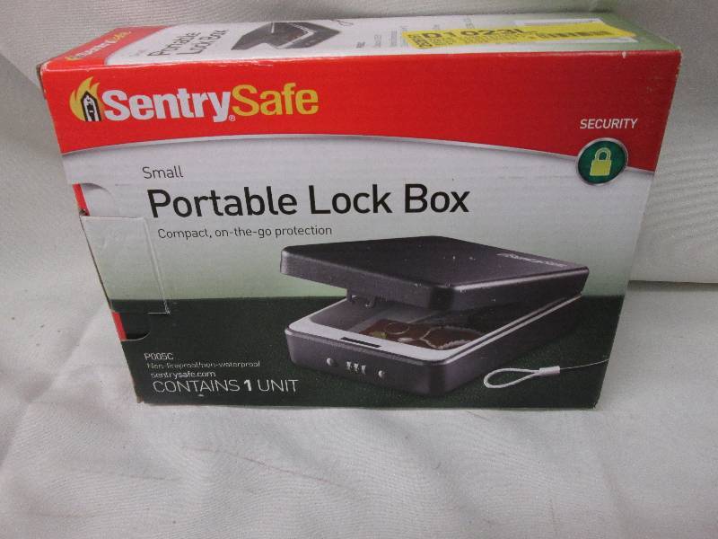lot 1 image: Sentry Safe Portable Lock Box...