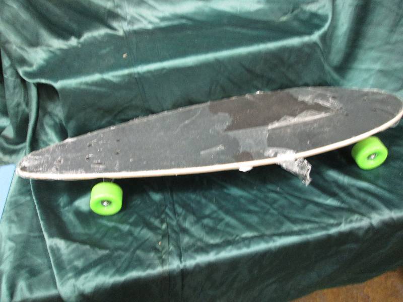 lot 104 image: Mountain Dew skateboard...