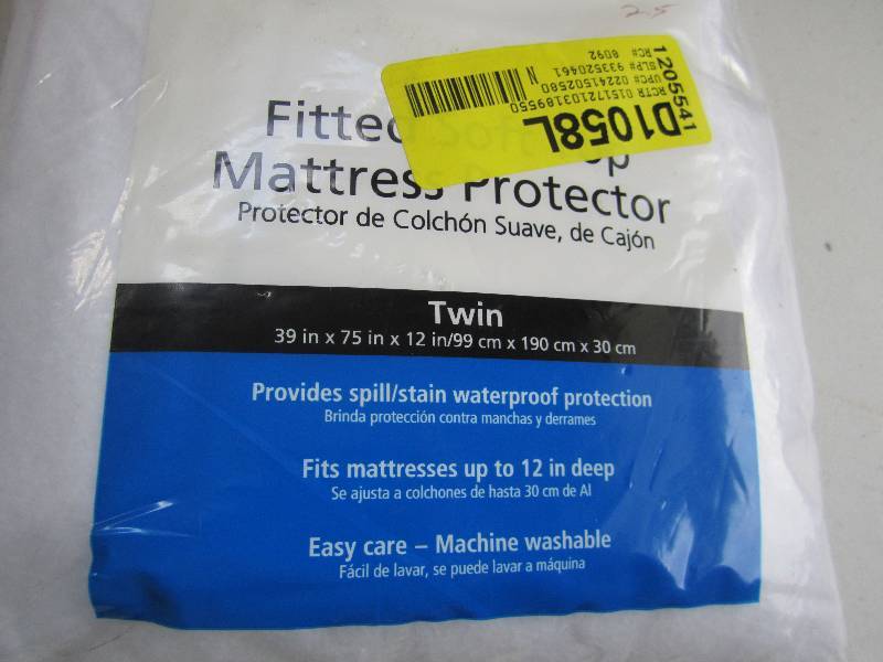 lot 19 image: twin size matress protector...