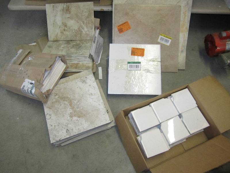 lot 48 image: assorted tiles some broken...