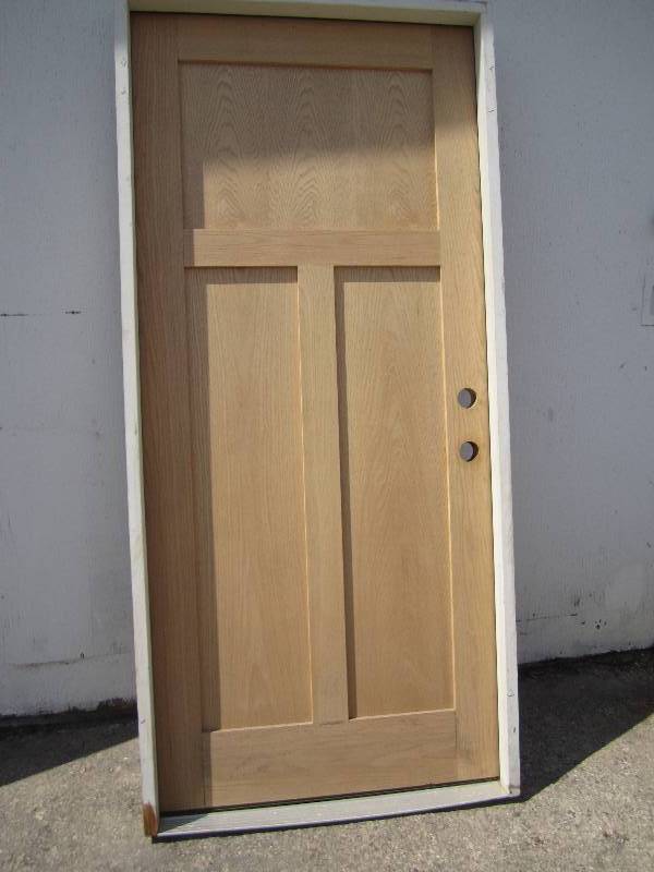 lot 63 image: Wood door, one side of the veneer i...