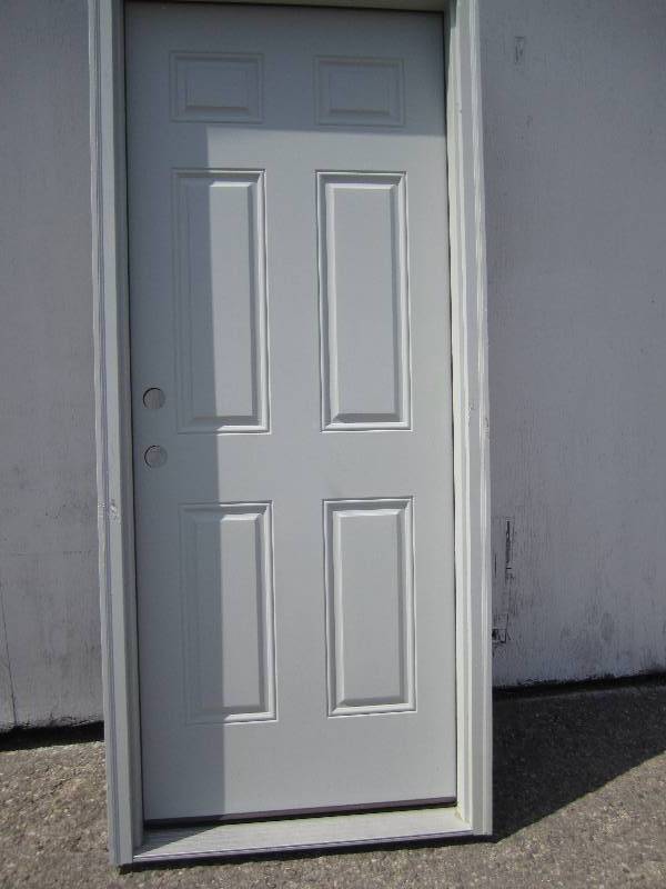 lot 64 image: Jeld Wen pre hung exterior steel do...