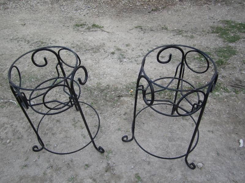 lot 99 image: 2 metal plant holders, 2 feet tall...