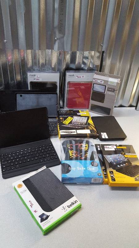 lot 13 image: Lot of Tablet Cases, some with keyboards