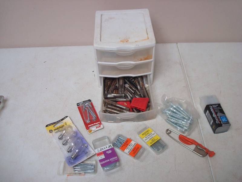 lot 25 image: Small Bin, With Some Screws And Drill Bits