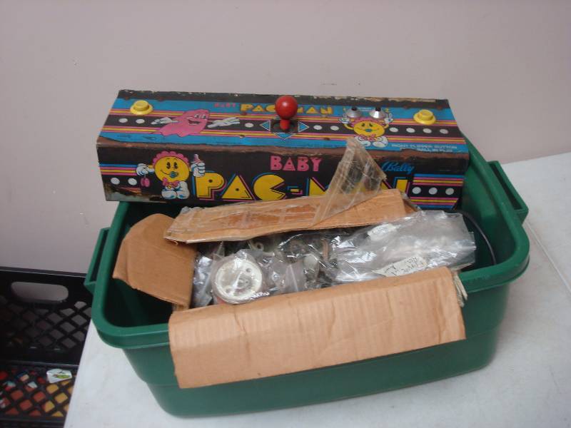 lot 45 image: Vintage Baby Pac-Man Video Game Parts