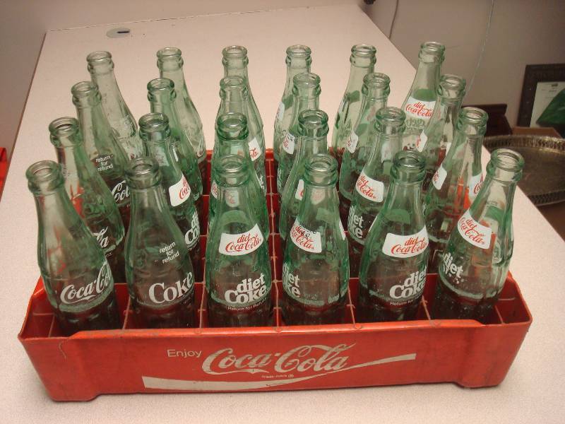 lot 87 image: Coke Crate With Some Bottles