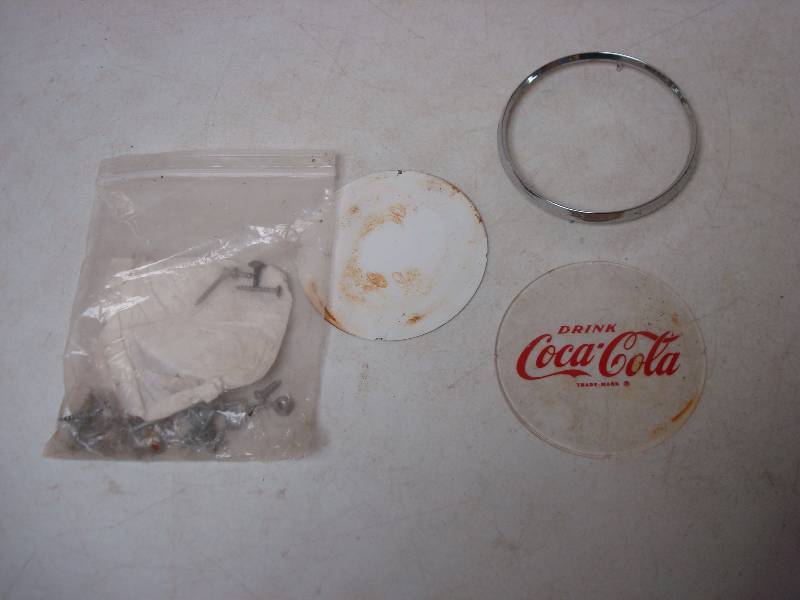 lot 110 image: Round Coca Cola Glass, Looks Like A Part For Something