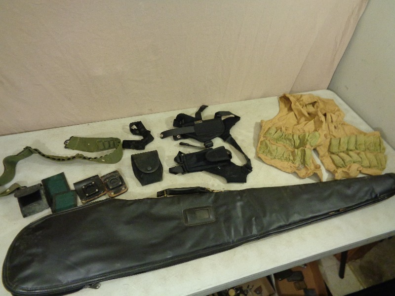 lot 50 image: Gun Case, Ammo Belts, Holsters, and More