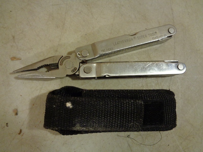 lot 53 image: Leatherman Multi Tool with Pouch
