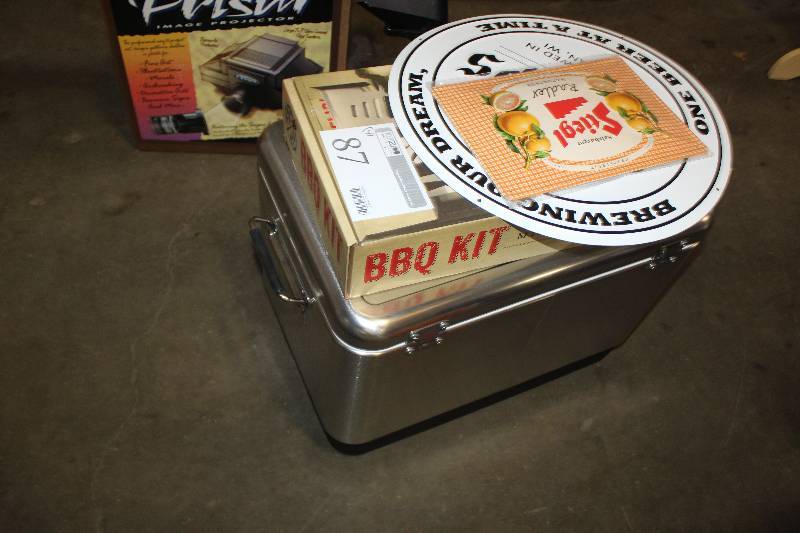 lot 87 image: Lot of (4) Including Jagermeister LOGO Steel Cooler Metal 3 Sheeps Sign Metal Stiegl Radler Sign Michael David LOGO BBQ Kit